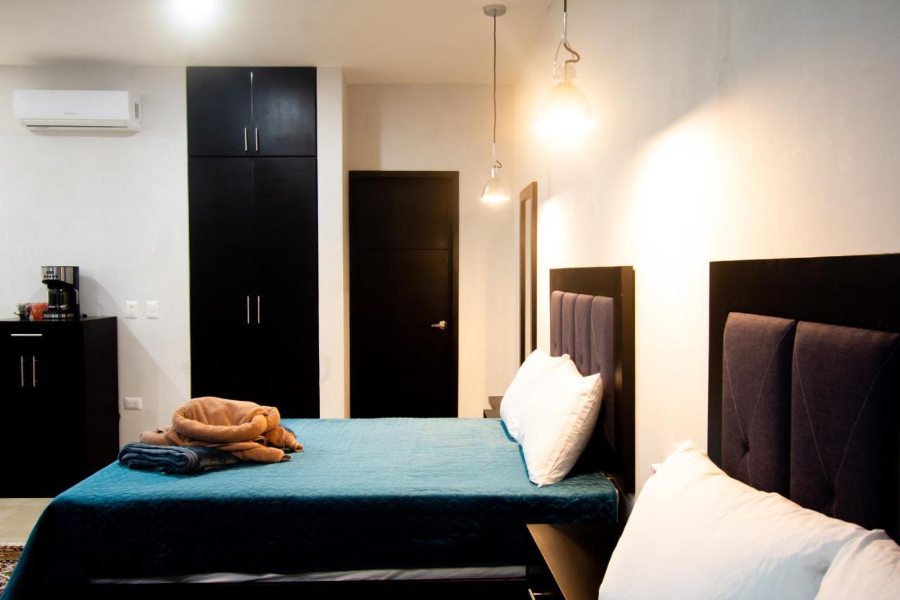 Hotel Casa Tortuga Tulum - Cenotes Park Inclusive Exteriör bild A bedroom in a serviced apartment in Lagos, Nigeria